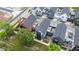 Aerial view of modern townhomes featuring rooftop decks, outdoor patios, and well-maintained landscaping at 1834 Rosette Way, Indianapolis, IN 46202