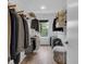 Walk-in closet with ample hanging space, shelving, and organized storage solutions at 1834 Rosette Way, Indianapolis, IN 46202