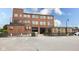 Commercial building with a brick exterior, outdoor patio, and modern architectural design at 1834 Rosette Way, Indianapolis, IN 46202