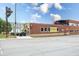 Commercial building featuring brick, a mural, and outdoor seating, reflecting urban culture at 1834 Rosette Way, Indianapolis, IN 46202