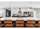 Bright kitchen featuring a large island with seating and modern stainless appliances at 1834 Rosette Way, Indianapolis, IN 46202