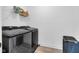 Modern laundry room with front load washer and dryer at 1834 Rosette Way, Indianapolis, IN 46202