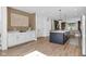 Bright living area featuring white cabinets, white countertops, and an island open to the living room at 1834 Rosette Way, Indianapolis, IN 46202