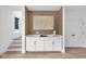 Bright living area featuring white cabinets, white countertops, and elegant decor at 1834 Rosette Way, Indianapolis, IN 46202