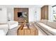 Open living room with a TV, modern decor, and comfortable seating, perfect for entertaining guests at 1834 Rosette Way, Indianapolis, IN 46202