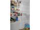 Well-organized pantry with white wire shelving stocked with various food items at 1834 Rosette Way, Indianapolis, IN 46202