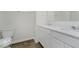 Bathroom with double vanity, white cabinetry, and modern fixtures at 18955 Seaforth Way, Westfield, IN 46074