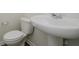 Clean and simple bathroom featuring a toilet and pedestal sink at 18955 Seaforth Way, Westfield, IN 46074