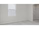 Bright bedroom featuring a window and a walk-in closet with white shelving at 18955 Seaforth Way, Westfield, IN 46074