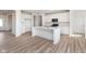 Open-concept kitchen features a large island, sleek appliances, and abundant cabinet space at 18955 Seaforth Way, Westfield, IN 46074