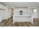 Spacious kitchen with a large center island, modern stainless steel appliances, and ample white cabinetry at 18955 Seaforth Way, Westfield, IN 46074