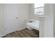 Cozy office nook with built-in desk next to a window and a door at 18955 Seaforth Way, Westfield, IN 46074