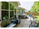 Relaxing backyard featuring a patio with a hot tub, outdoor seating, and green landscaping at 18973 Elder Ridge Dr, Noblesville, IN 46062