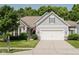 Charming home featuring a well-manicured lawn, two-car garage, and inviting curb appeal at 18973 Elder Ridge Dr, Noblesville, IN 46062