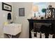 Well-organized laundry room features a large utility sink and plenty of storage space at 18973 Elder Ridge Dr, Noblesville, IN 46062