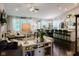 Open-concept living area with abundant natural light, fireplace, and contemporary decor at 18973 Elder Ridge Dr, Noblesville, IN 46062