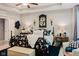 Charming main bedroom with a plush bed, elegant decor, and a ceiling fan for added comfort at 18973 Elder Ridge Dr, Noblesville, IN 46062