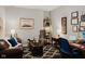 Comfortable home office featuring a cozy seating area, decorative accents and wood floors at 18973 Elder Ridge Dr, Noblesville, IN 46062