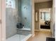 Modern glass shower with tile surround and a built-in bench at 18973 Elder Ridge Dr, Noblesville, IN 46062
