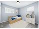 Comfortable bedroom with bright interior, playful decor and ample space for storage at 1931 Brentwood Dr, Anderson, IN 46011