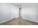 Bedroom with hardwood floors, closet, and an open doorway leading to other rooms at 1931 Brentwood Dr, Anderson, IN 46011