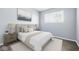Serene bedroom with soft lighting, light walls and plush bedding for a relaxing retreat at 1931 Brentwood Dr, Anderson, IN 46011