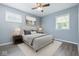 Cozy bedroom with soft lighting, calm walls and plush bedding for a relaxing retreat at 1931 Brentwood Dr, Anderson, IN 46011