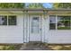 Charming home featuring a welcoming front porch and white siding at 1931 Brentwood Dr, Anderson, IN 46011