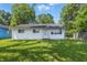 Charming single-story home with a well-maintained lawn and inviting curb appeal on a sunny day at 1931 Brentwood Dr, Anderson, IN 46011