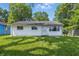 Charming home with white siding and a well-maintained front lawn at 1931 Brentwood Dr, Anderson, IN 46011