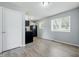 Functional kitchen with black appliances, and bright cabinets, and hardwood flooring at 1931 Brentwood Dr, Anderson, IN 46011