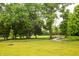 Scenic community park featuring picnic benches, a walking path, a playground, and well-manicured lawns at 196 Park Ave, Bargersville, IN 46106