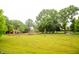 Wide angle photo of a community park with a playground and walking path at 196 Park Ave, Bargersville, IN 46106
