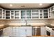 Contemporary kitchen with white cabinetry, butcher block countertops, and stainless appliances at 196 Park Ave, Bargersville, IN 46106