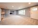Comfortable living room with fresh carpet, an open floor plan and access to the kitchen at 196 Park Ave, Bargersville, IN 46106