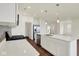 Well-lit kitchen featuring stainless steel appliances, a large island, and seamless flow to adjacent living areas at 2021 Frost Line Ln, Greenfield, IN 93927