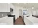 Bright kitchen with stainless steel appliances, white cabinets, and a sleek island with a modern faucet at 2021 Frost Line Ln, Greenfield, IN 93927