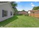 A large backyard with a fence offers plenty of space for outdoor activities at 26098 Six Points Rd, Sheridan, IN 46069