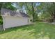 The detached garage exterior features white siding and provides extra storage or parking space at 26098 Six Points Rd, Sheridan, IN 46069