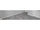Hallway features new paint and stylish gray woodgrain flooring at 26098 Six Points Rd, Sheridan, IN 46069