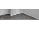 Hallway features new paint and stylish gray woodgrain flooring at 26098 Six Points Rd, Sheridan, IN 46069