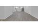 Open-concept living area with modern flooring, perfect for entertaining guests at 26098 Six Points Rd, Sheridan, IN 46069