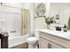 Bright bathroom with tub-shower, vanity with counter space and stylish decor at 2612 Ruffian Dr, Westfield, IN 46074