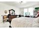 Bedroom featuring a large bed, dresser, and window, filled with natural light at 2612 Ruffian Dr, Westfield, IN 46074