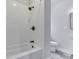Bathroom featuring a white subway tiled shower with a dark bronze shower head at 2860 Winthrop Ave, Indianapolis, IN 46205