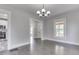 Open-concept living area with hardwood floors, natural light, and easy access to the kitchen at 2860 Winthrop Ave, Indianapolis, IN 46205