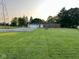 Spacious backyard offering a large green space and detached garage at 2951 S Elizabeth St, Indianapolis, IN 46203