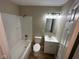 Well-lit bathroom with a shower-tub combination and modern vanity at 2951 S Elizabeth St, Indianapolis, IN 46203