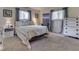 Comfortable bedroom with calming colors, soft carpet, and plenty of natural light at 343 E Waterbury Rd, Indianapolis, IN 46227