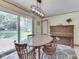 Cozy dining area with natural light and a view to the back yard at 343 E Waterbury Rd, Indianapolis, IN 46227